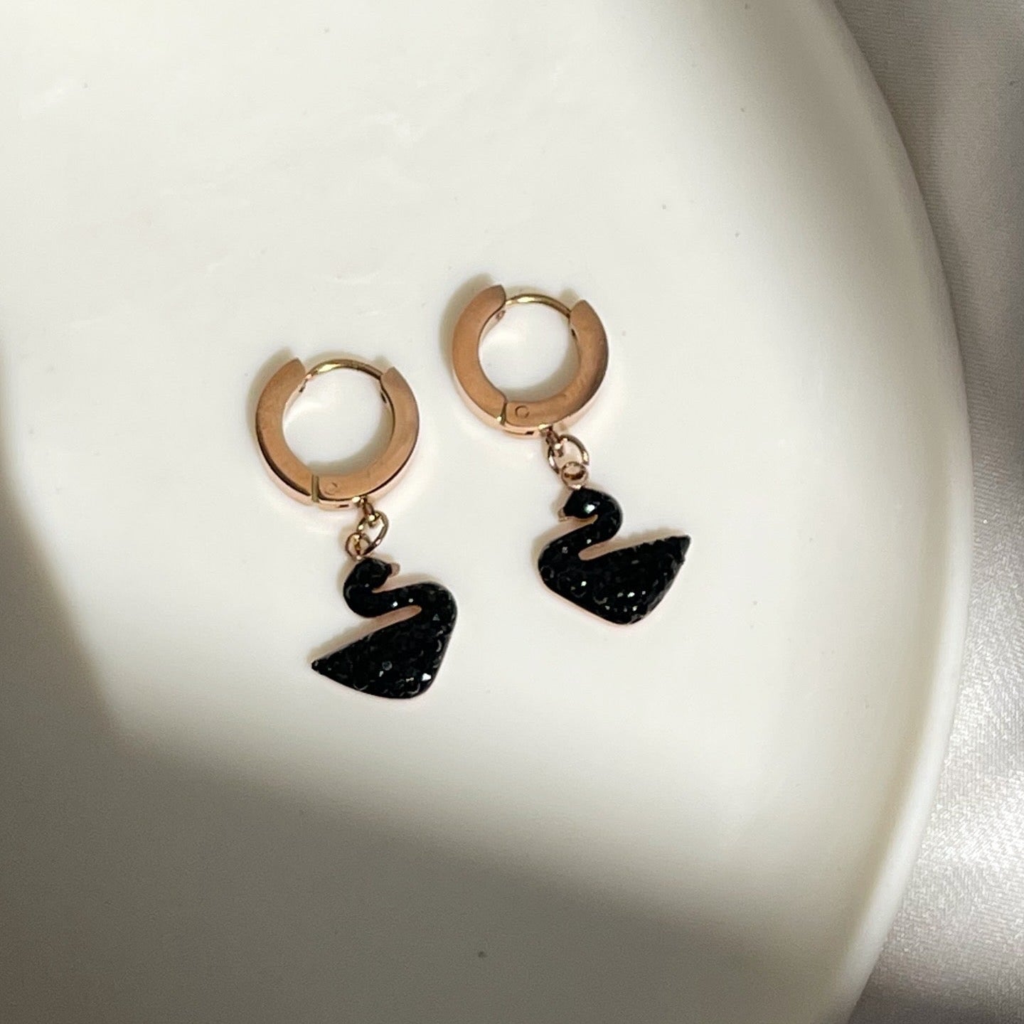 Black Swan dangling hoops