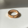 Stone paved rose gold love ring