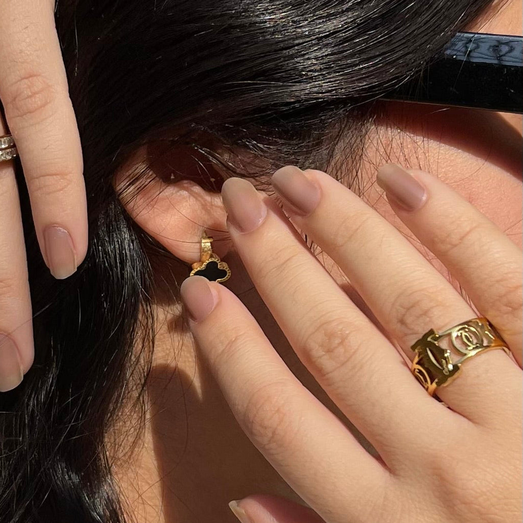 Gold toned pierced ring