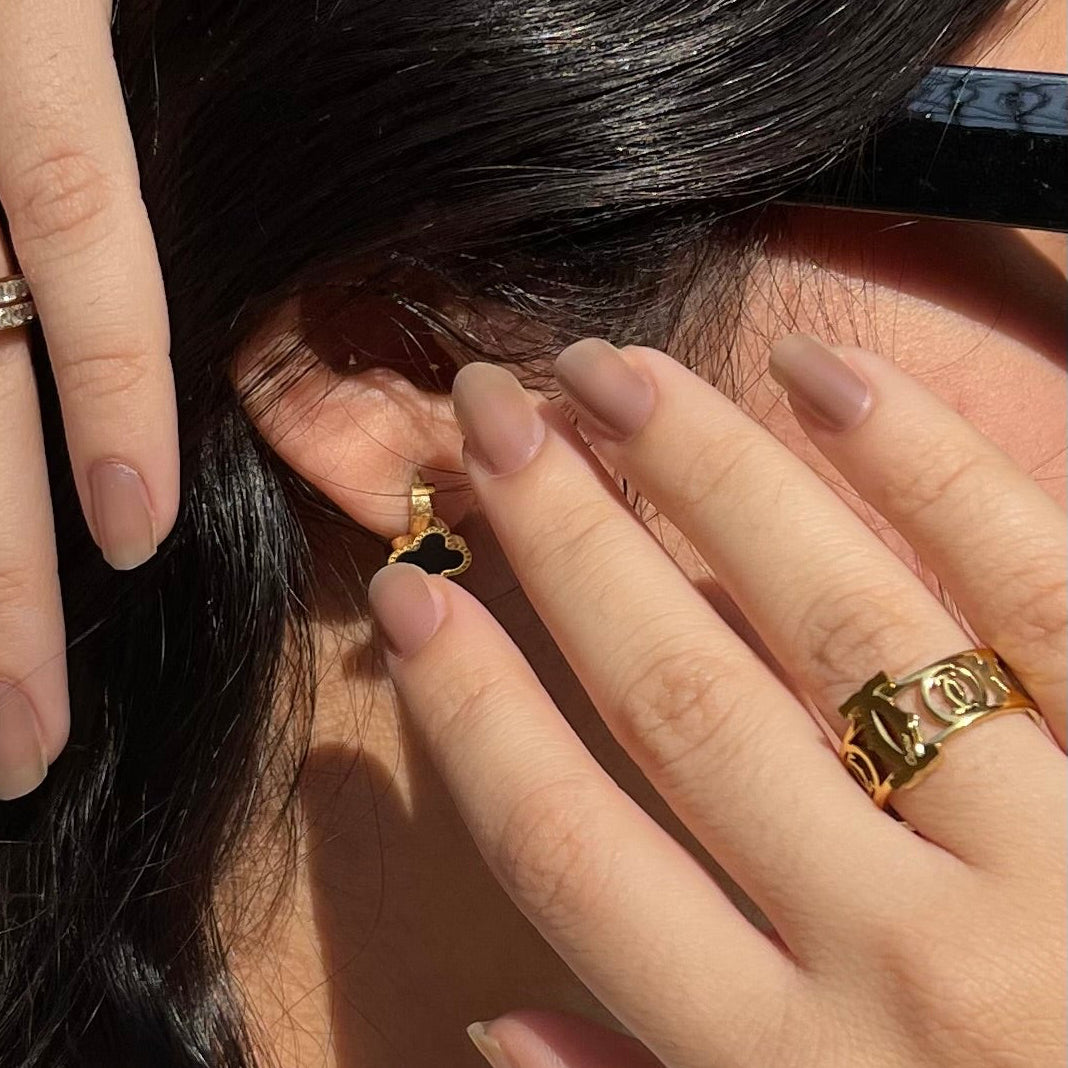 Gold toned pierced ring